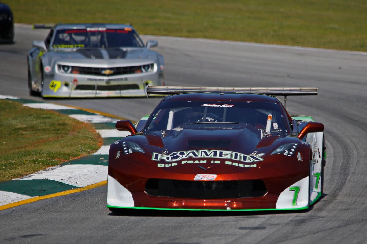 Claudio Burtin in front